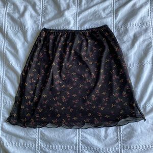 Black floral mini skirt